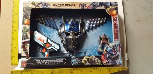 MASCARA-ROBOT-PISTOLA-LANZA-DARDOS-7201      15500.00 $