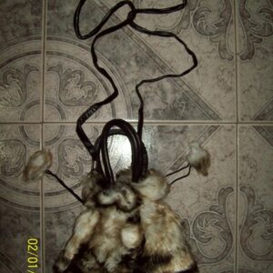 CARTERA ATIGRADA POM POM FRUNCE     3500.00  $