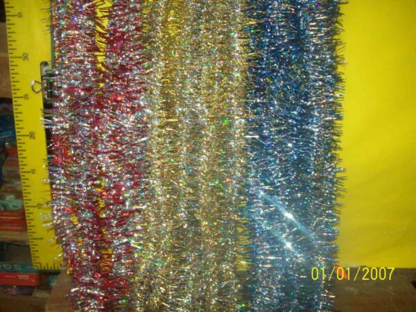 BOA FLECO RULO OLOGRAMADA 1209      620.00 $