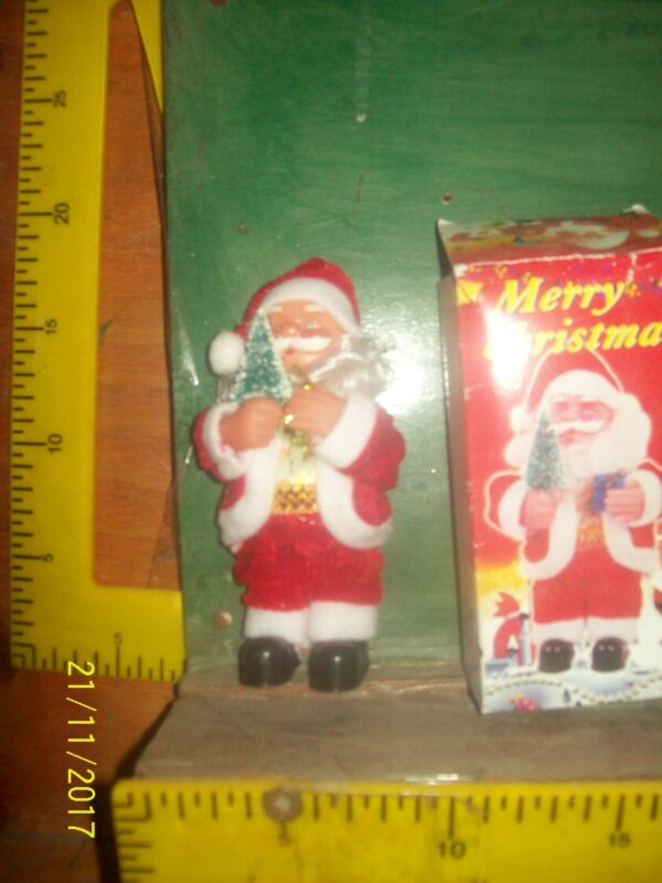 PAPA NOEL MINI MUSICAL  15 CM     4500.00$